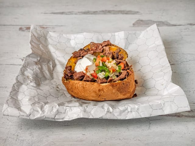 Loaded Steak Potato.